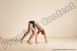 Underwear Gymnastic poses Man White Slim Bald Brown Dancing Dynamic poses Academic